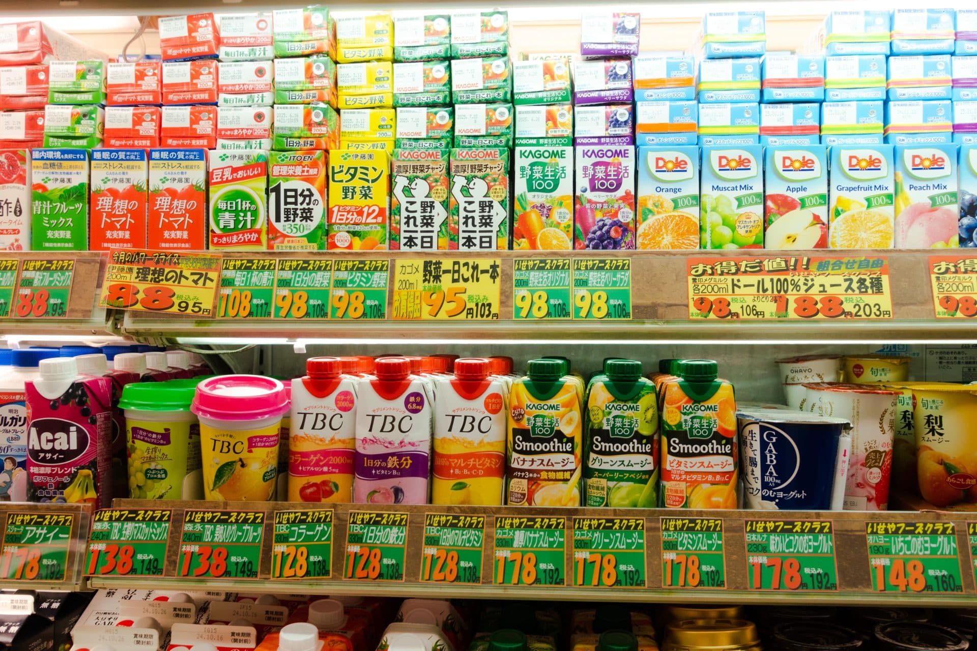 Vibrant beverage aisle inside a Japanese convenience store
