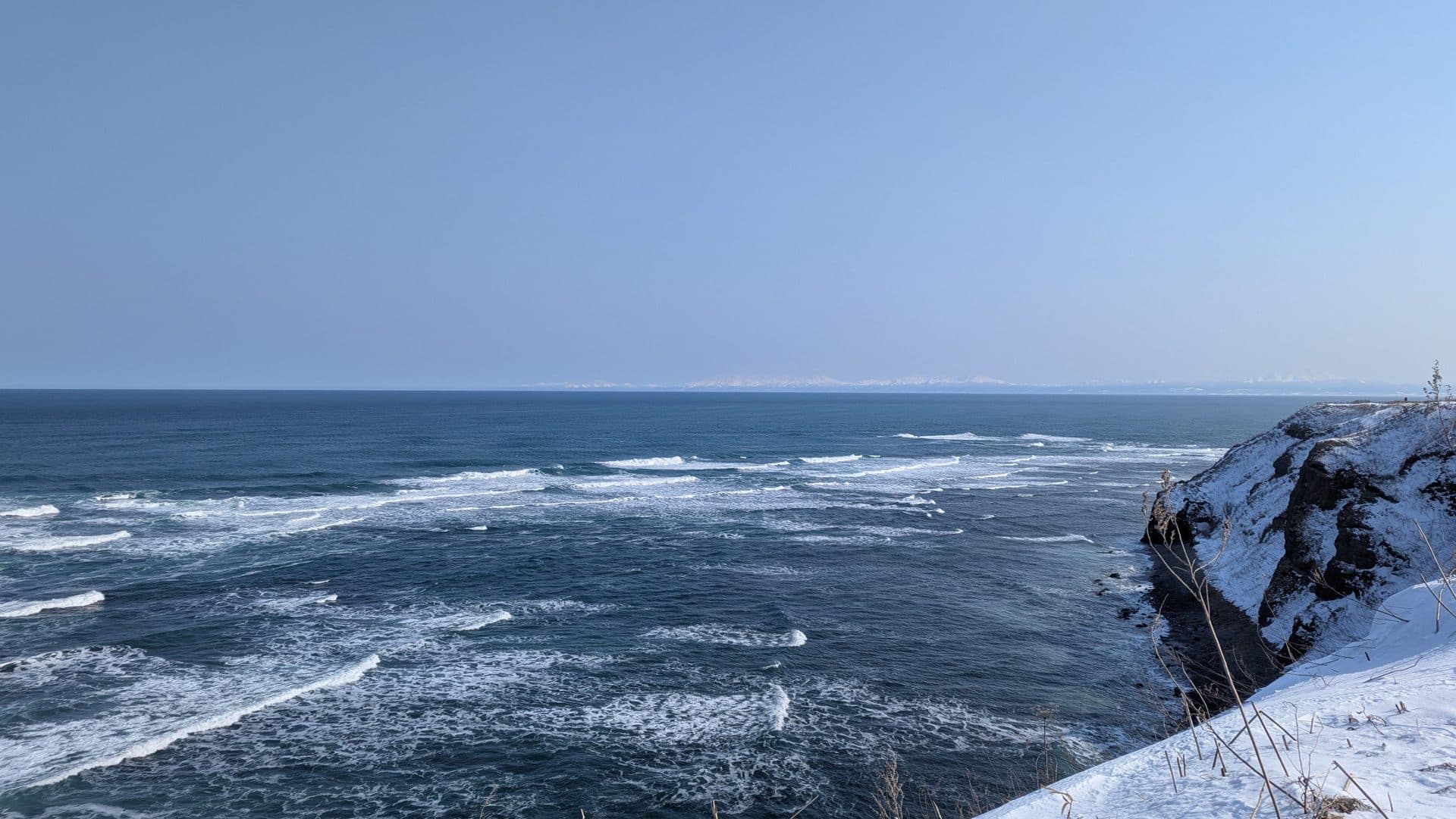 Winter sea and snowy coastline in japan