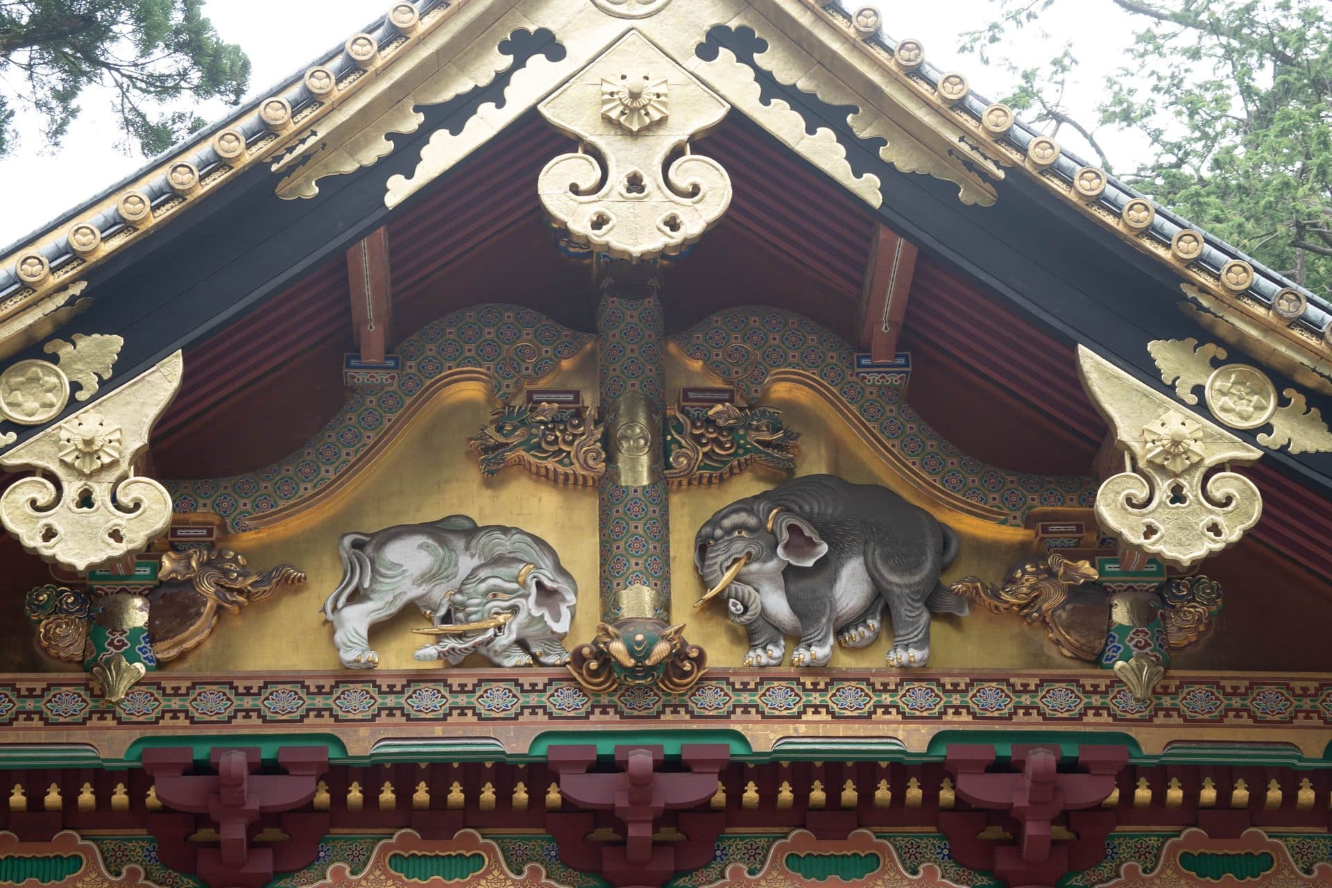 Ornate temple roof with elephant carvings
