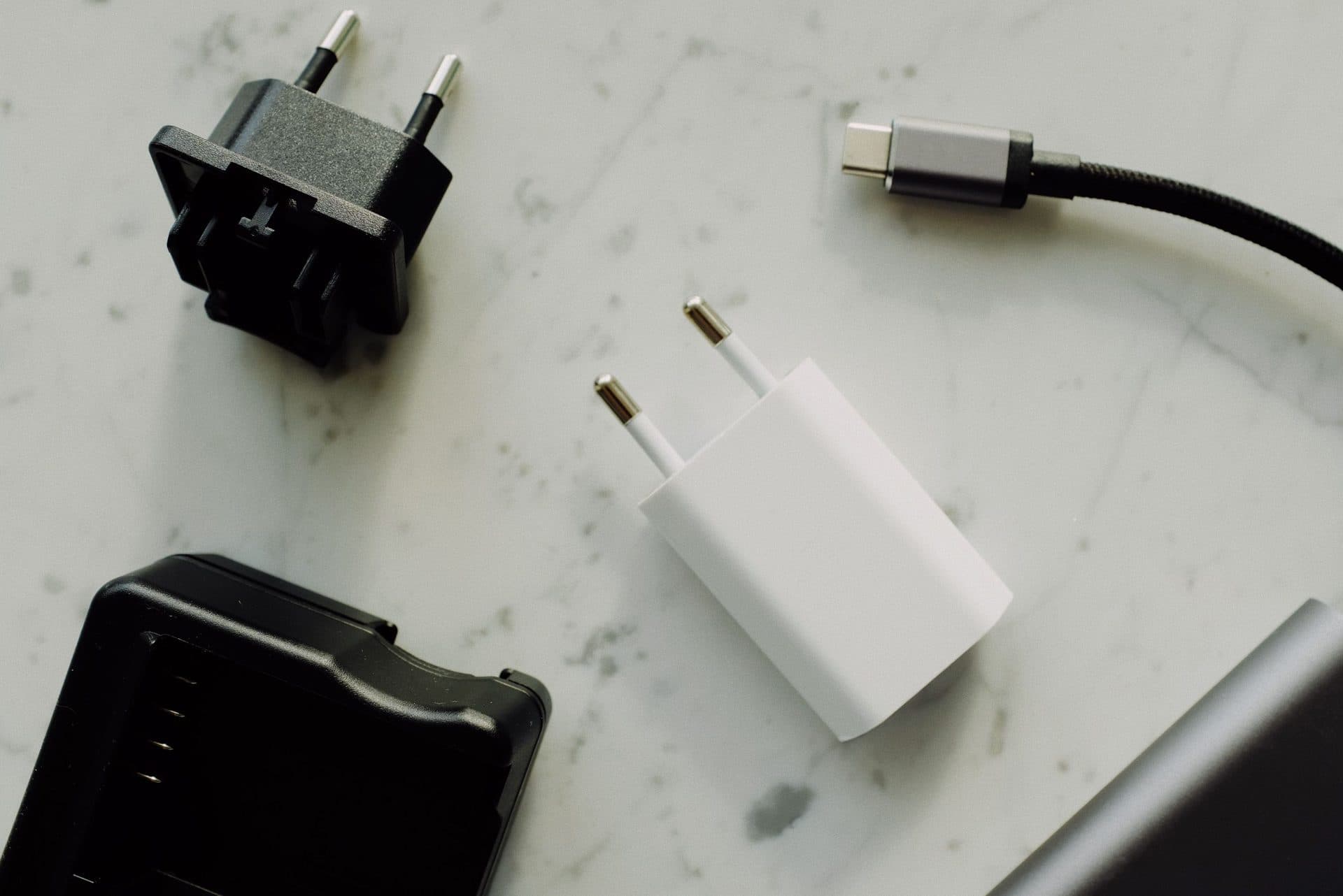 Collection of power adapters and a USB-C charging cable